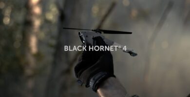 Black hornet 4 military uav drone taking a flight in the woods