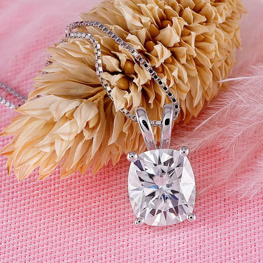 Seamless moissanite tennis necklace with brilliant round cut stones in a silver setting.